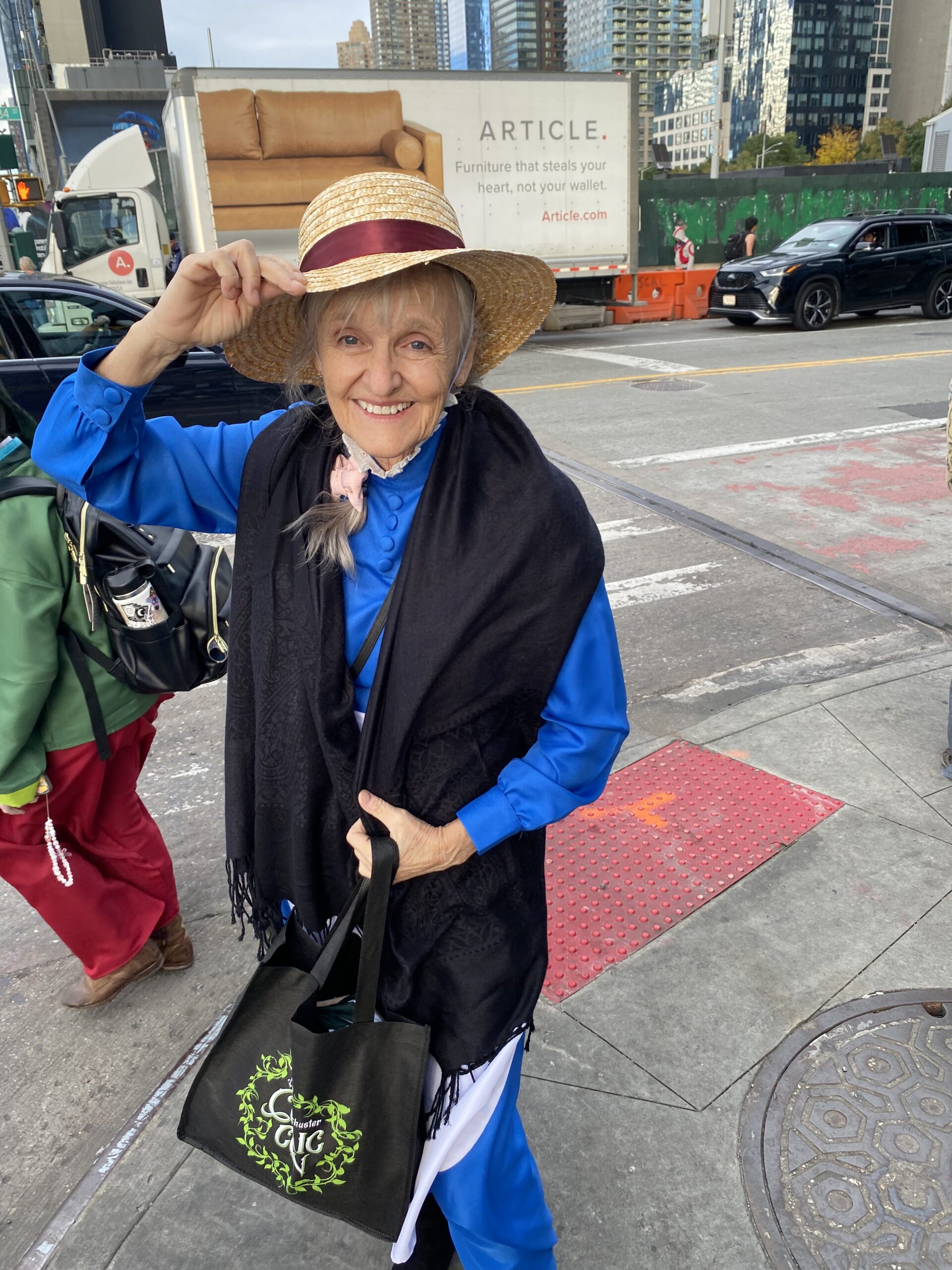 A cosplayer in frankly exquisite Sophie cosplay, leaving New York Comic-Con for the evening. Photo credit: Josh Nelson