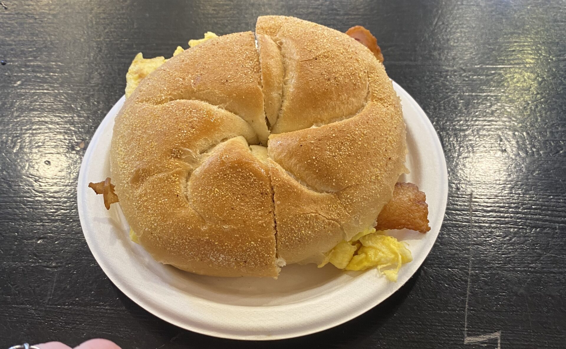 A bacon, egg, and cheese sandwich on a roll. A NYC staple food for any morning commuter on the go. Photo credit: Josh Nelson